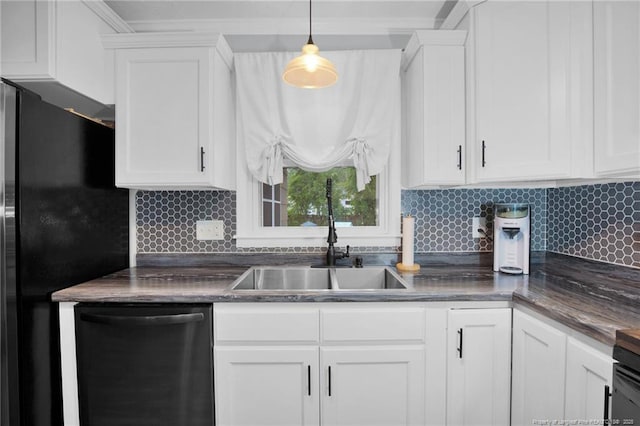 kitchen featuring white cabinets and dishwasher