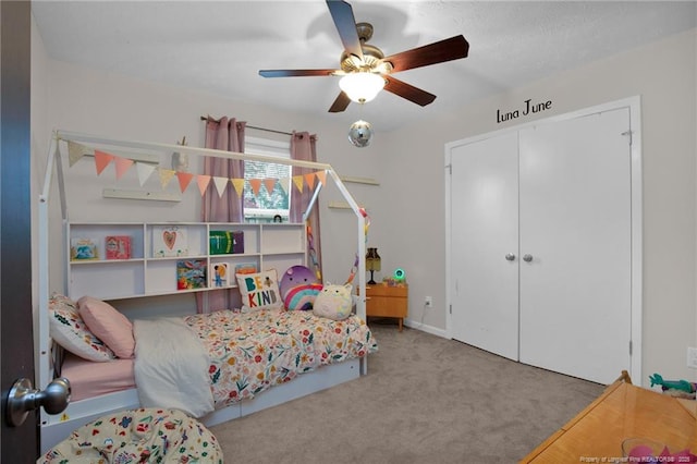 bedroom featuring light carpet and ceiling fan