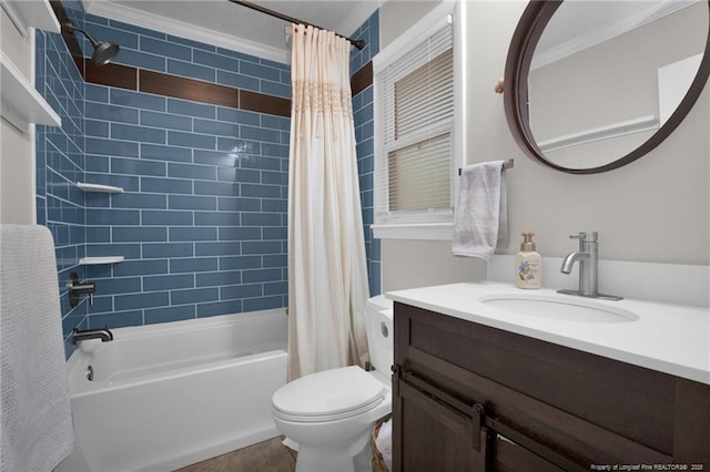 full bathroom featuring toilet, vanity, shower / bath combo, and ornamental molding