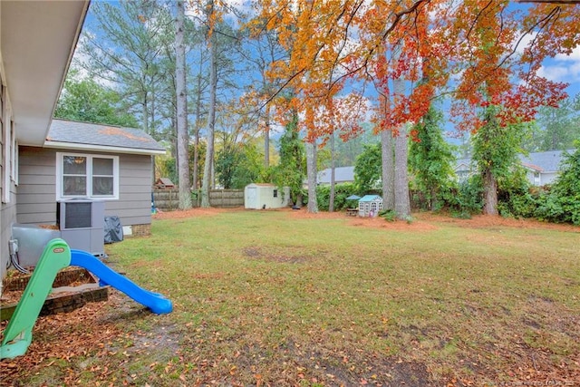 view of yard with a storage shed