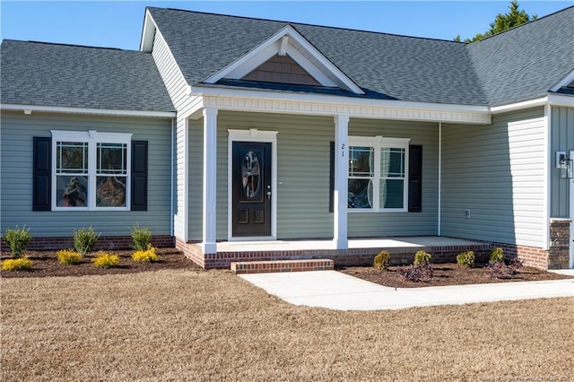 entrance to property with covered porch