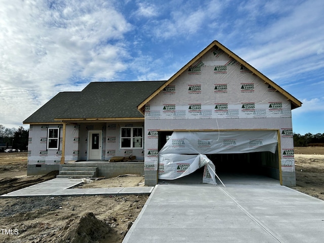 property under construction with covered porch