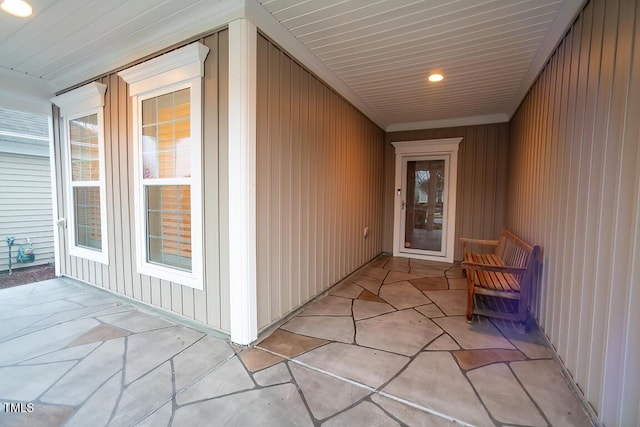 doorway to property with a patio area