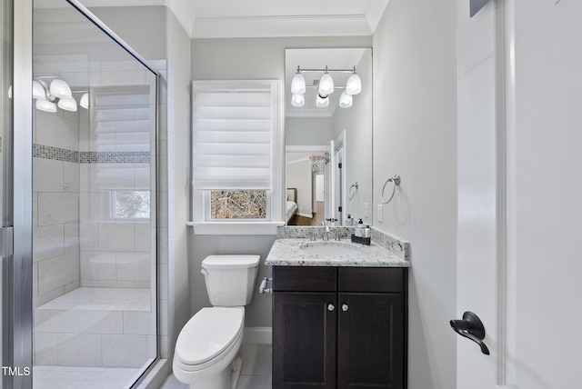 bathroom with a shower with door, tile patterned floors, toilet, and vanity