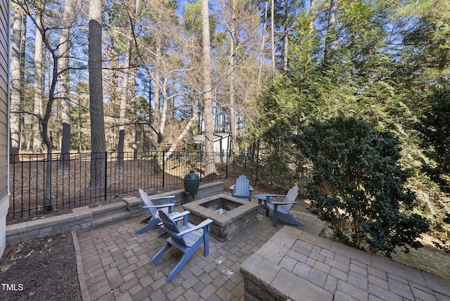 view of patio featuring a fire pit