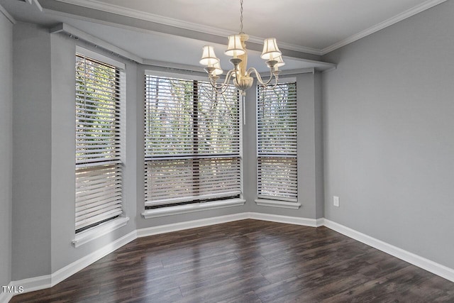 unfurnished dining area with an inviting chandelier, ornamental molding, and dark wood-type flooring