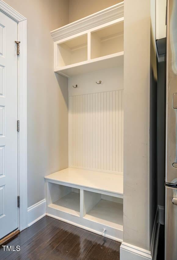 mudroom with dark hardwood / wood-style floors