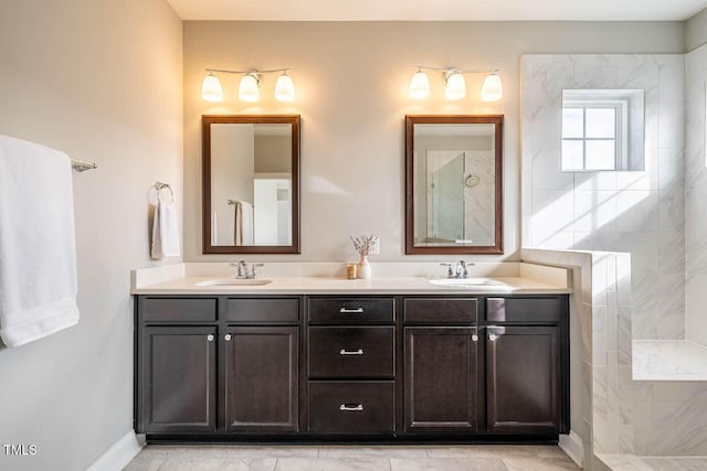 bathroom featuring vanity and walk in shower