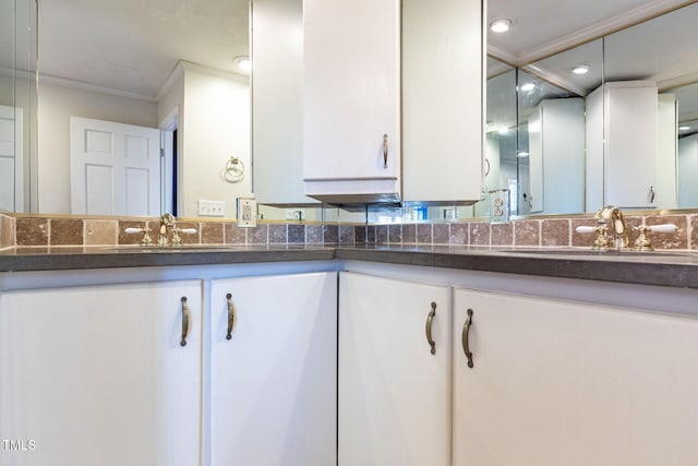 full bathroom with vanity and ornamental molding