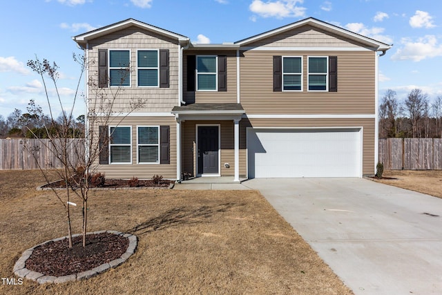 view of front facade with a garage, concrete driveway, and fence