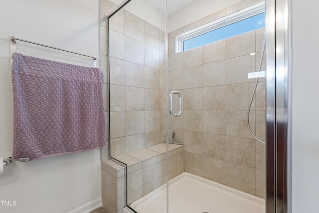 bathroom featuring an enclosed shower