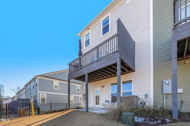 rear view of property with a patio area