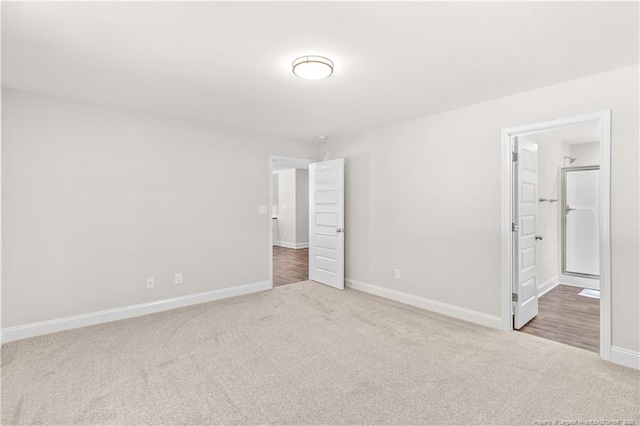 unfurnished bedroom featuring carpet