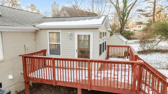 view of snow covered deck