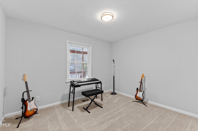 miscellaneous room with light colored carpet