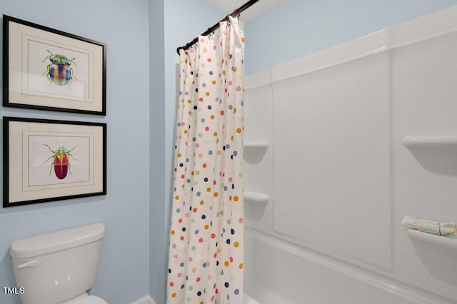 bathroom featuring toilet and shower / bathtub combination with curtain