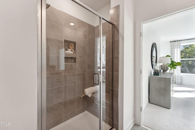 bathroom featuring an enclosed shower