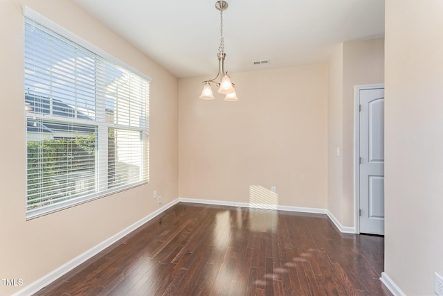 empty room featuring dark hardwood / wood-style floors