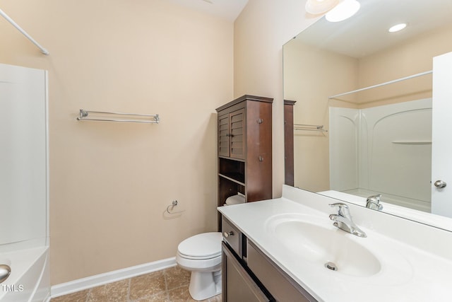 full bathroom with washtub / shower combination, vanity, and toilet