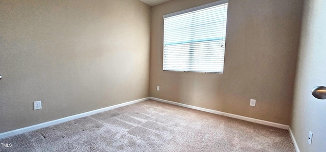 view of carpeted spare room