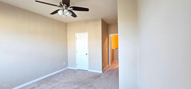 unfurnished bedroom featuring ceiling fan and light colored carpet