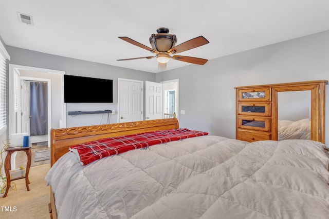 carpeted bedroom featuring ceiling fan