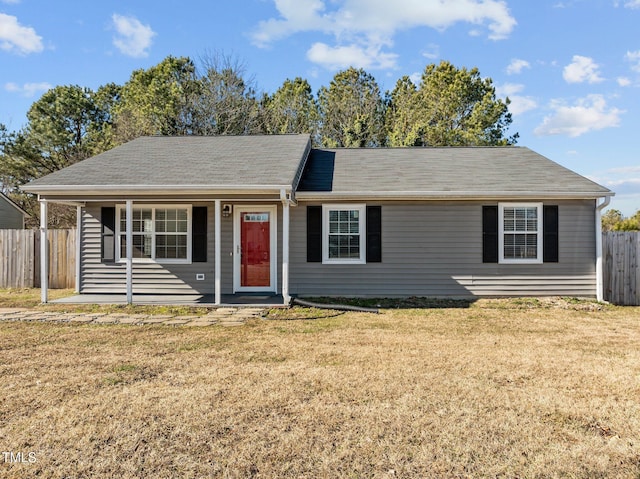 ranch-style house featuring a front yard