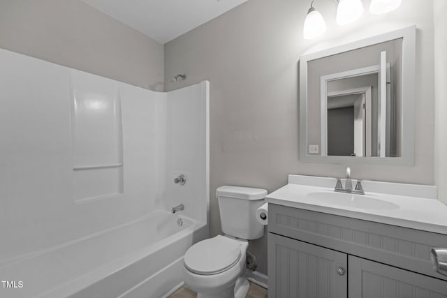 full bathroom with vanity, shower / washtub combination, and toilet