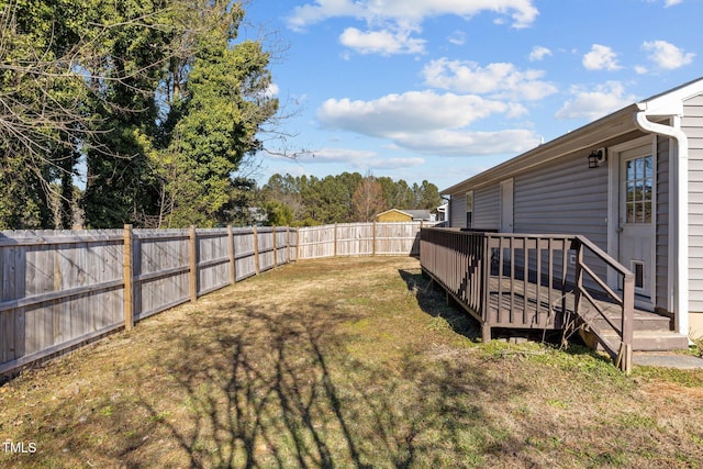 view of yard featuring a deck