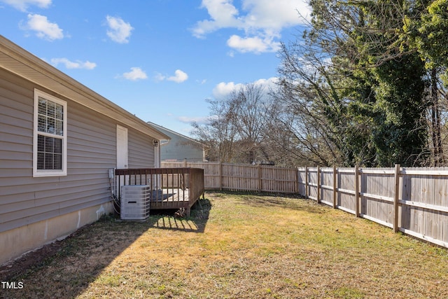 view of yard with a wooden deck and cooling unit