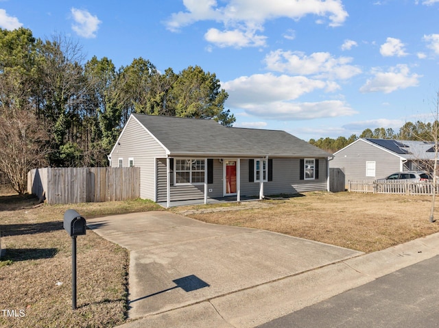 ranch-style house with a front yard