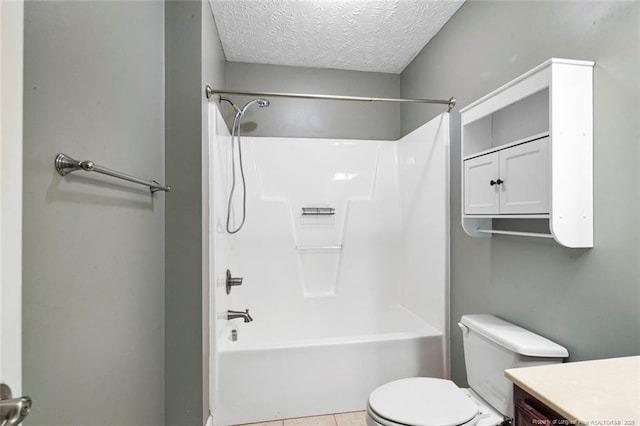 full bathroom featuring a textured ceiling, tile patterned floors, vanity, shower / washtub combination, and toilet