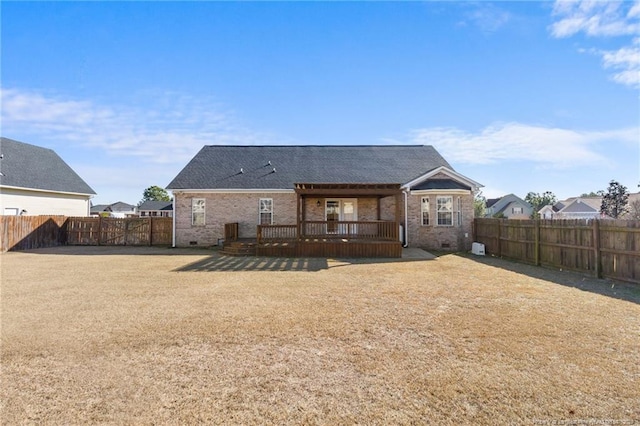 rear view of house featuring a deck