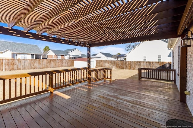 wooden deck featuring a pergola