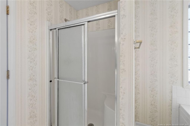 bathroom featuring walk in shower