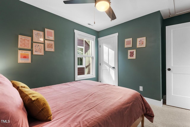 carpeted bedroom with ceiling fan