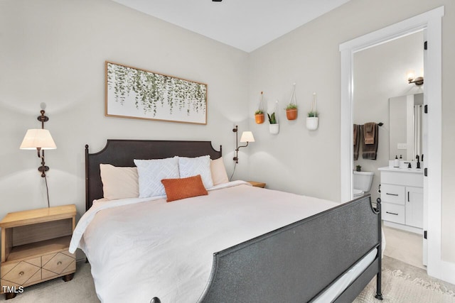 bedroom featuring ensuite bathroom