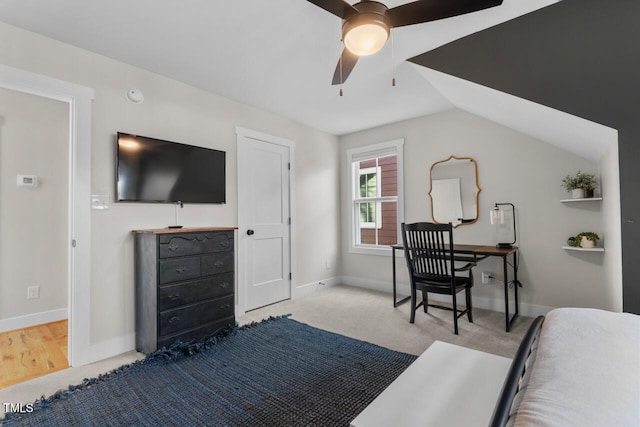 carpeted bedroom with lofted ceiling and ceiling fan