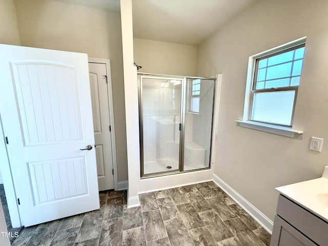 bathroom featuring vanity and walk in shower