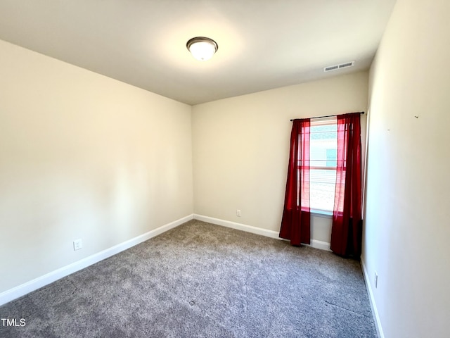 empty room with carpet flooring