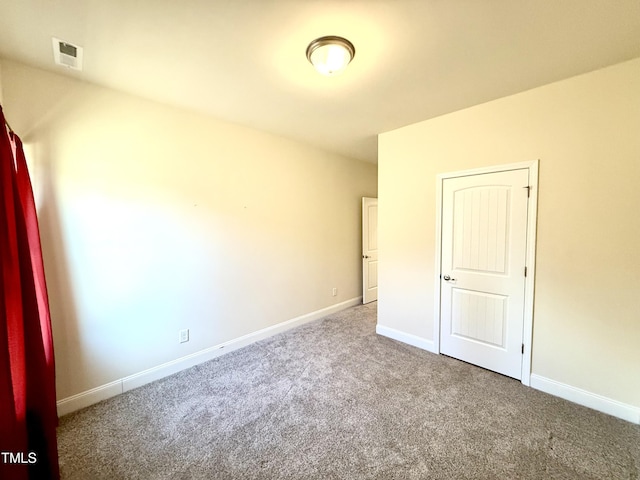 unfurnished bedroom featuring carpet