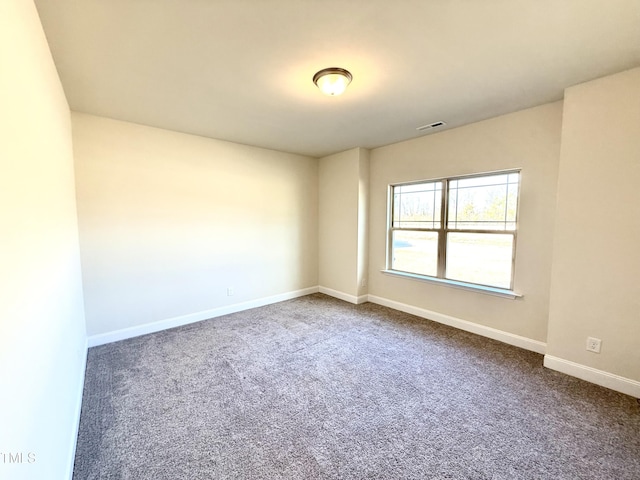 view of carpeted spare room