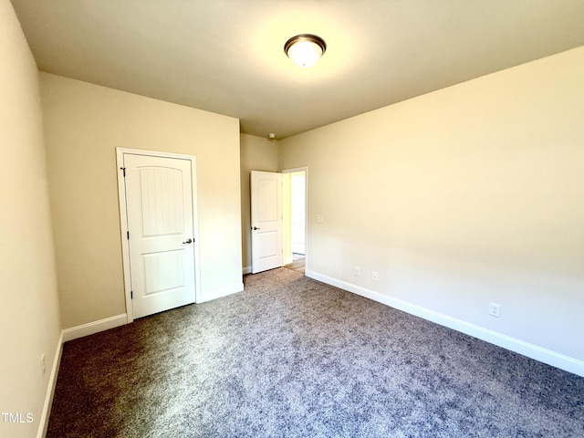 unfurnished bedroom featuring carpet flooring