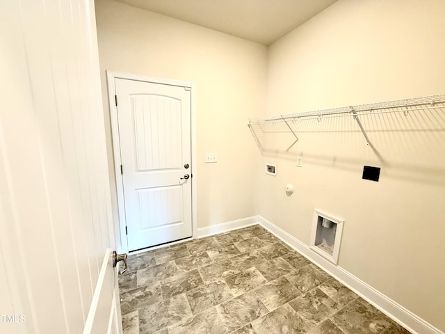 laundry area featuring gas dryer hookup, hookup for a washing machine, and electric dryer hookup