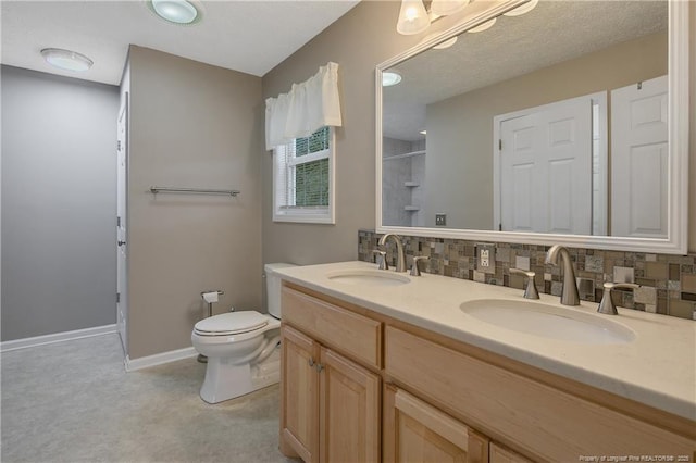 bathroom with toilet, an enclosed shower, vanity, and decorative backsplash