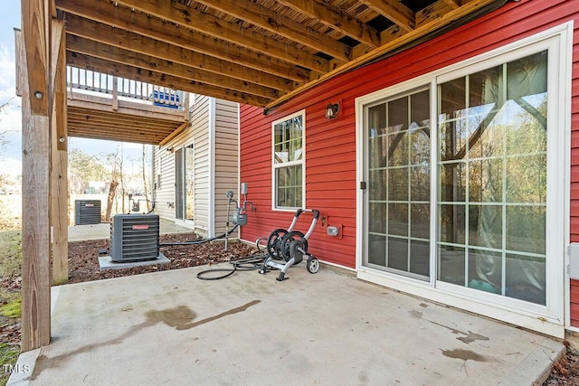 view of patio featuring cooling unit