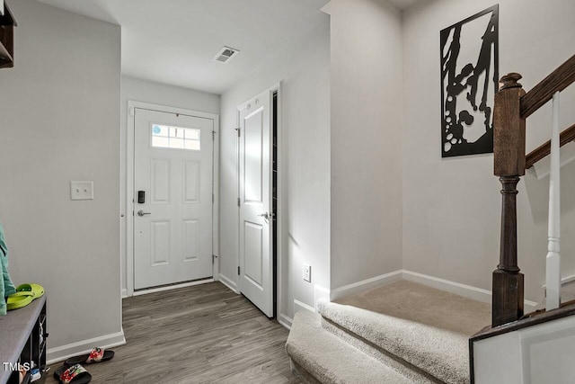 foyer featuring hardwood / wood-style floors