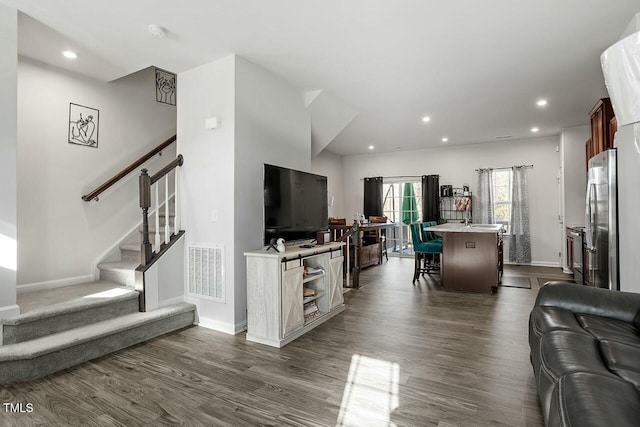 living room with dark wood-type flooring