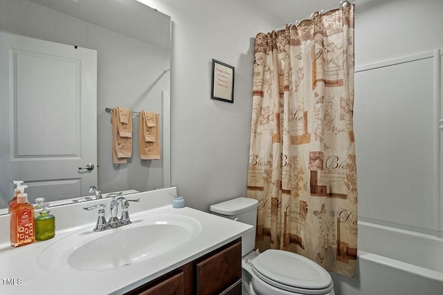 full bathroom featuring shower / bath combo with shower curtain, toilet, and vanity