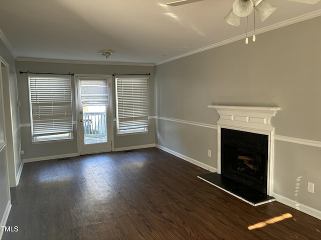 unfurnished living room with dark wood-type flooring, ceiling fan, and crown molding